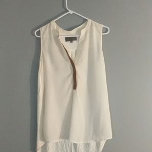 White high low blouse with brown leather detail